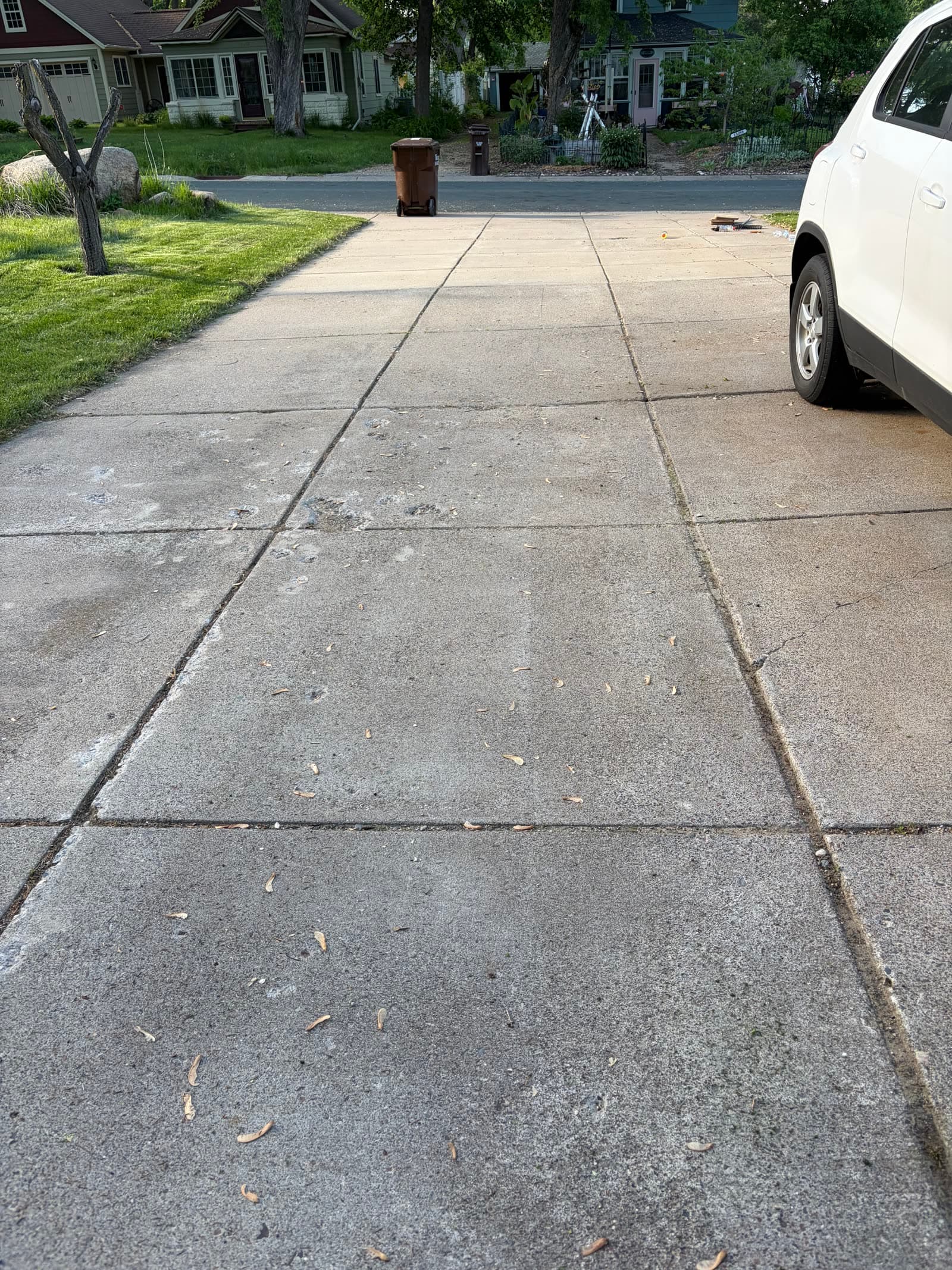 Driveway after cleanup with seams and edges cleared